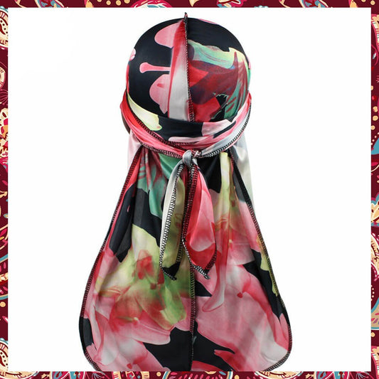 Silky durag graced by intricate black floral patterns.