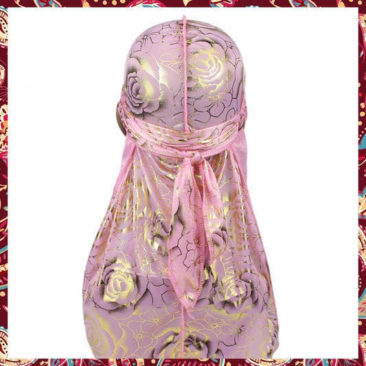 Silk pink durag with rose patterns.
