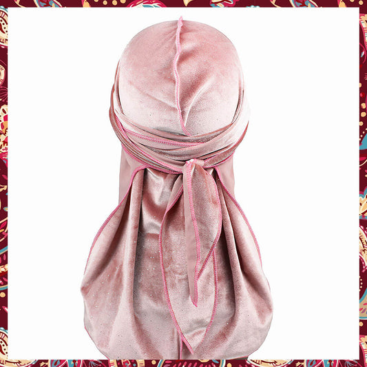 Pink Velvet Durag adorned with crystals, providing a detailed view of fabric.