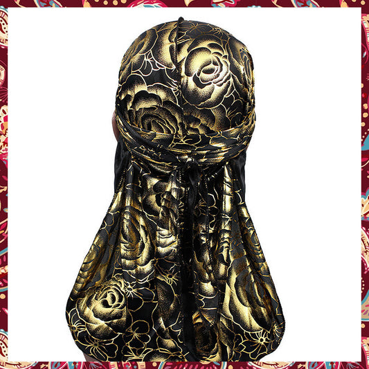 Silk black and gold durag, with rose patterns.