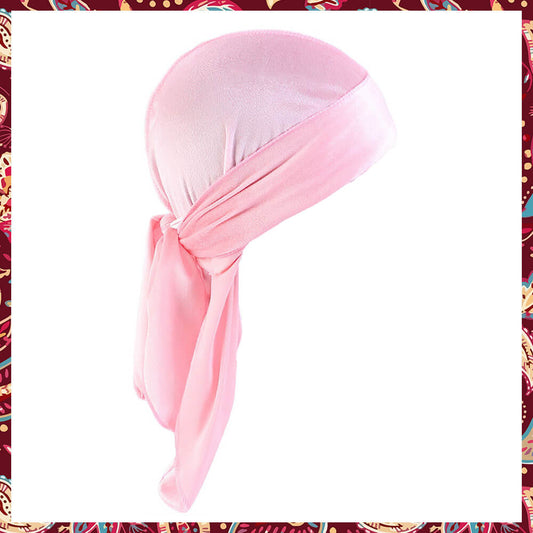 Chic Pink Velvet Durag showcasing its soft hue and fine quality.