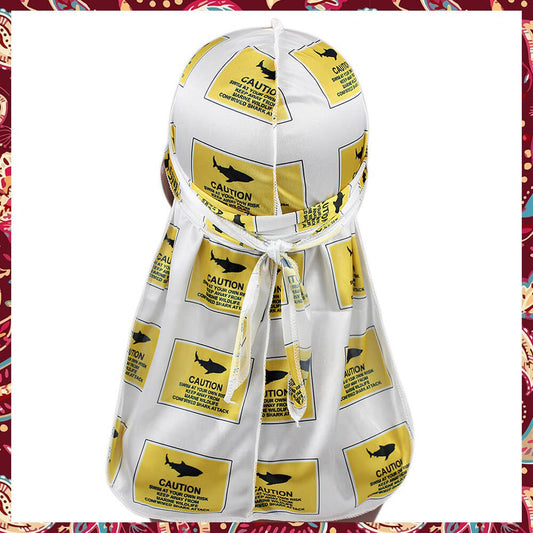 White silk durag adorned with captivating yellow shark caution motifs.